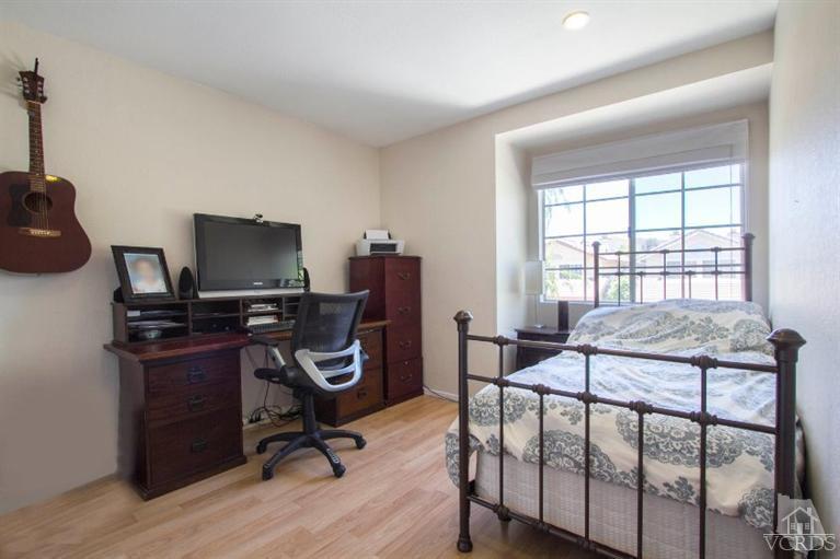 560 Fairfield Road Simi Valley, CA 93065 - Photo 27 of 32 a bedroom with furniture and a window