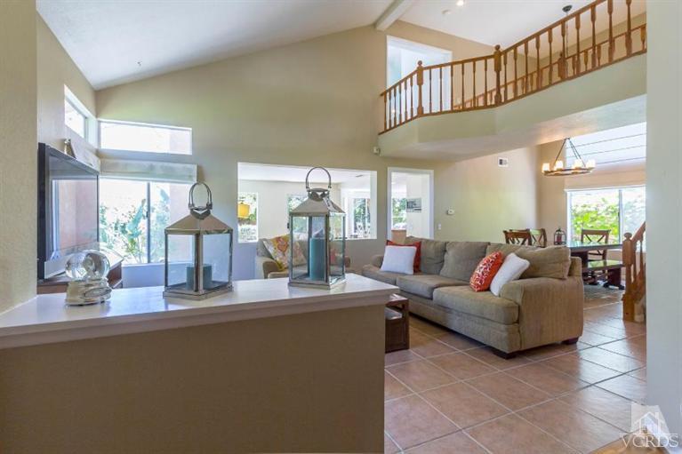 560 Fairfield Road Simi Valley, CA 93065 - Photo 6 of 32 a living room with fireplace furniture and a large window