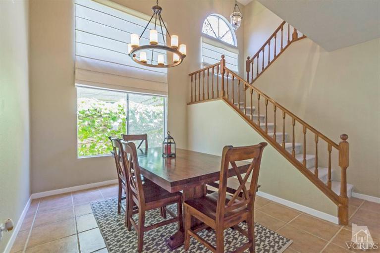 560 Fairfield Road Simi Valley, CA 93065 - Photo 9 of 32 a view of a dining room with furniture window and wooden floor