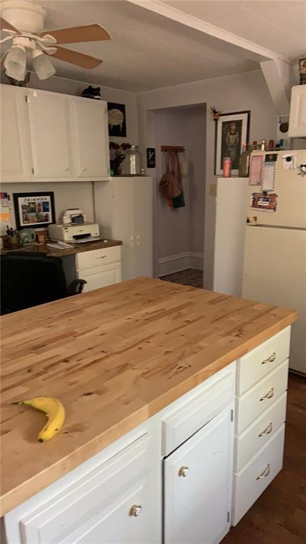 4 Neff Street Pittsburgh, PA 15211 - Photo 3 of 12 a kitchen with a stove and white cabinets
