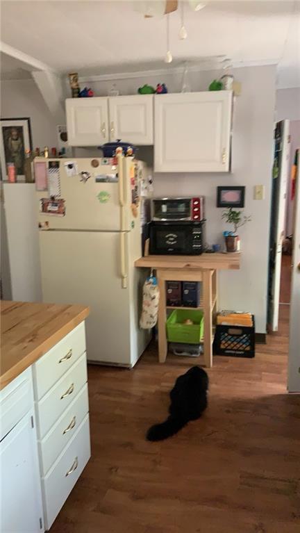 4 Neff Street Pittsburgh, PA 15211 - Photo 10 of 12 a kitchen with a refrigerator and a stove