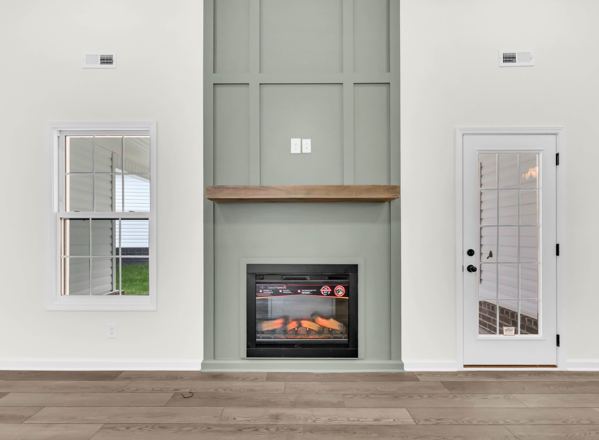 2555 Rafiki Drive Clarksville, TN 37042 - Photo 12 of 42 a living room with a fireplace and a window