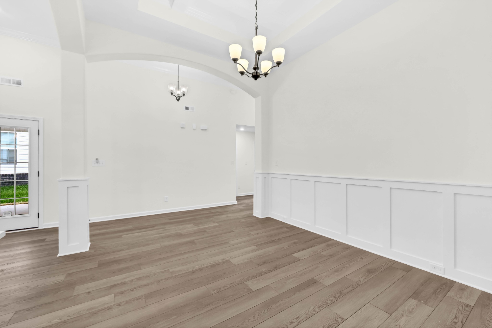 2555 Rafiki Drive Clarksville, TN 37042 - Photo 20 of 42 a view of an empty room with wooden floor