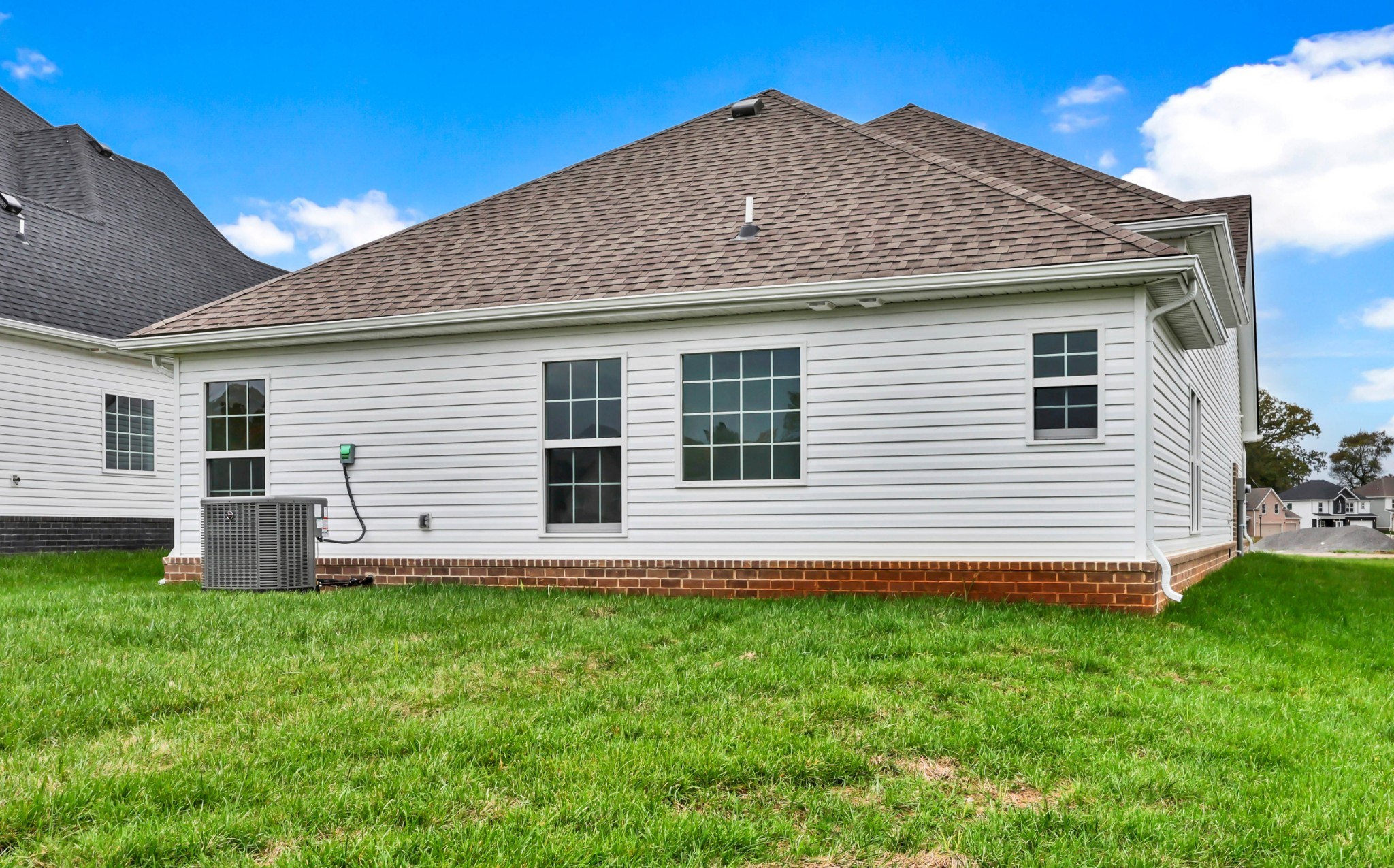 2555 Rafiki Drive Clarksville, TN 37042 - Photo 40 of 42 a front view of a house with a garden