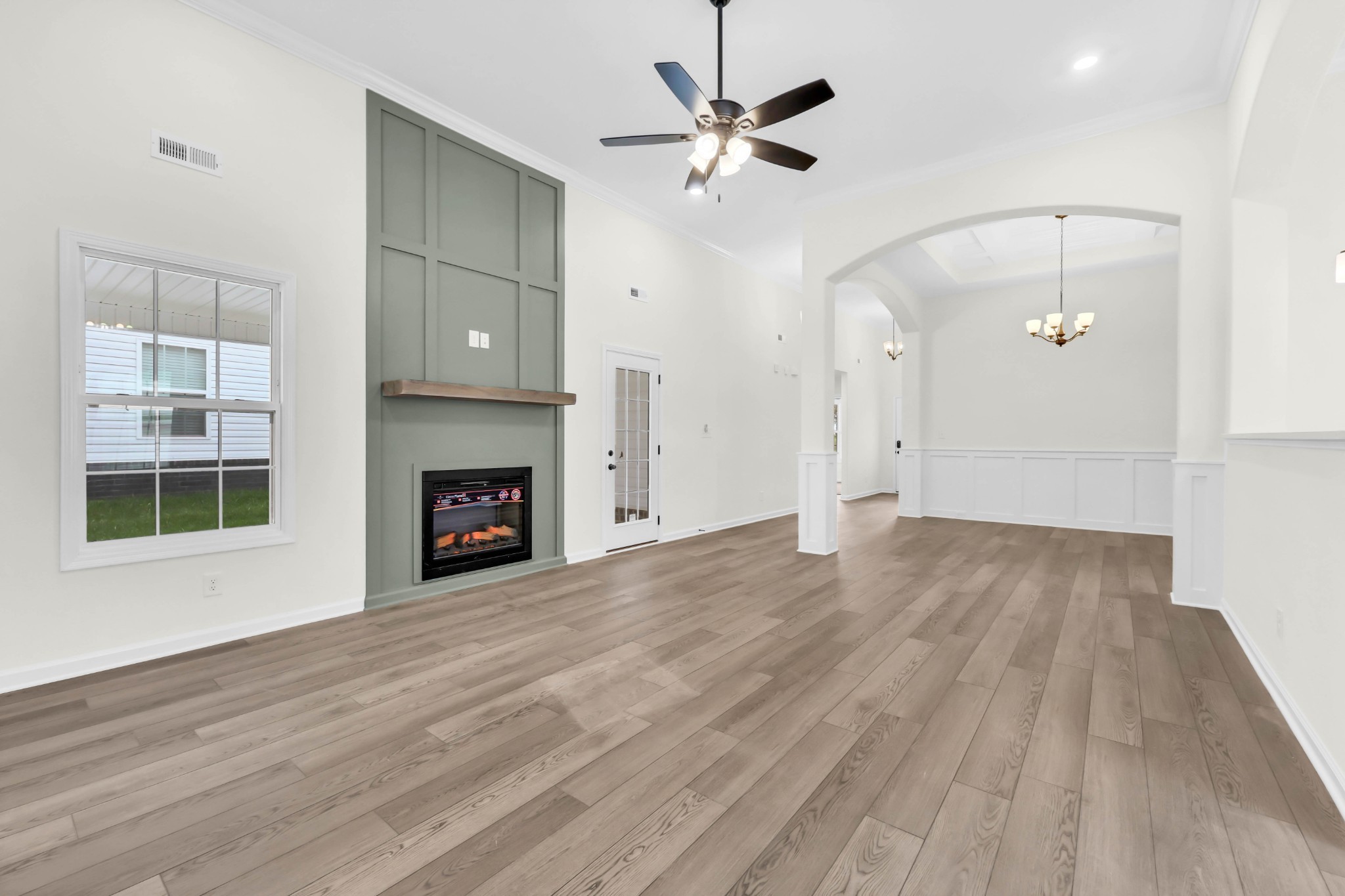2555 Rafiki Drive Clarksville, TN 37042 - Photo 10 of 42 a view of an empty room with a fireplace and a window