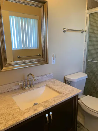 a bathroom with a sink and a toilet