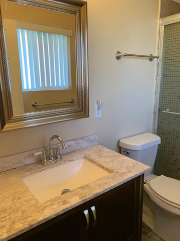 a bathroom with a sink and a toilet
