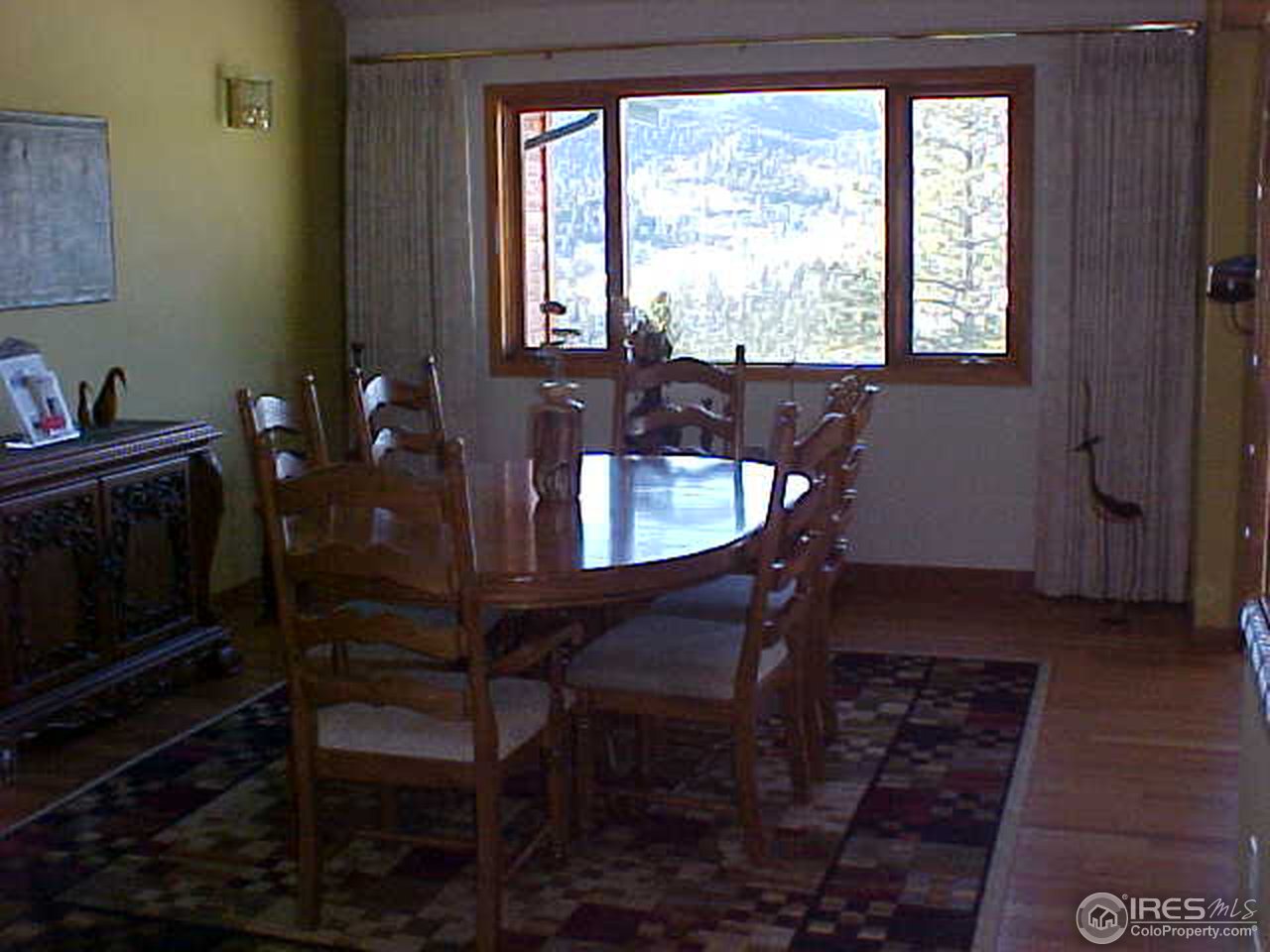 388 Peakview Road Boulder, CO 80302 - Photo 4 of 9 a view of a dining room with furniture and window