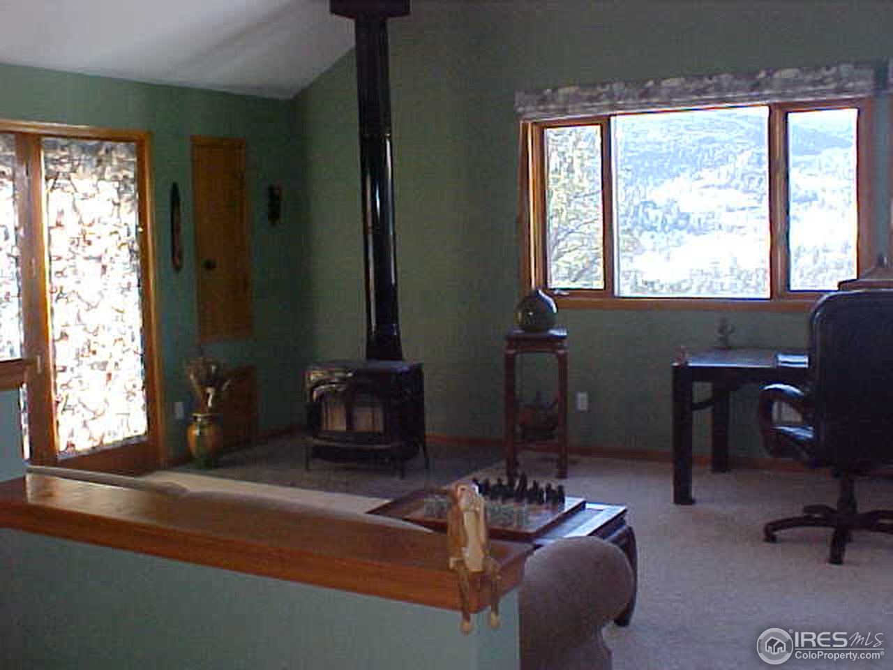 388 Peakview Road Boulder, CO 80302 - Photo 6 of 9 a living room with furniture and a window