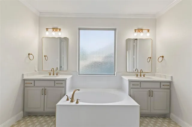 a bathroom with a shower and a glass door