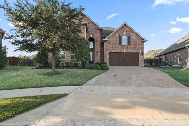 a view of a brick house with a door