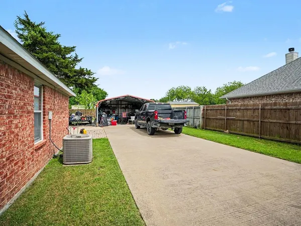 a view of a house with a back yard
