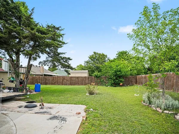 a view of a backyard with a garden