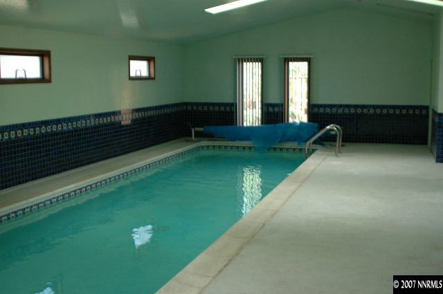 4287 Muirwood Court Reno, NV 89509 - Photo 2 of 7 a view of a balcony with a swimming pool