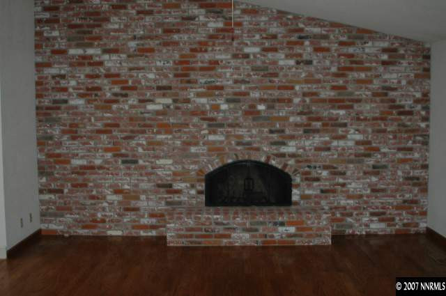 4287 Muirwood Court Reno, NV 89509 - Photo 4 of 7 a room with a wooden floor