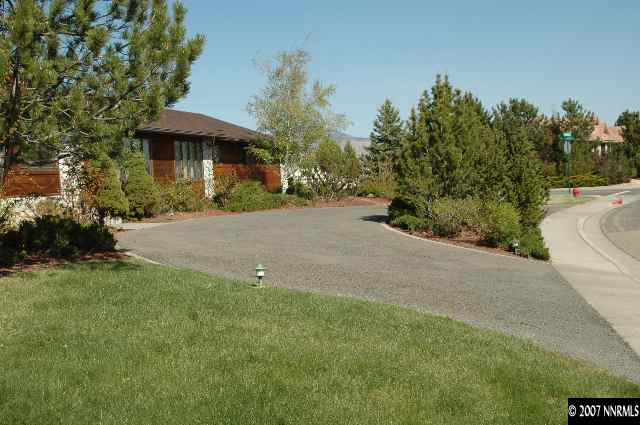 4287 Muirwood Court Reno, NV 89509 - Photo 7 of 7 a view of a house with backyard and trees