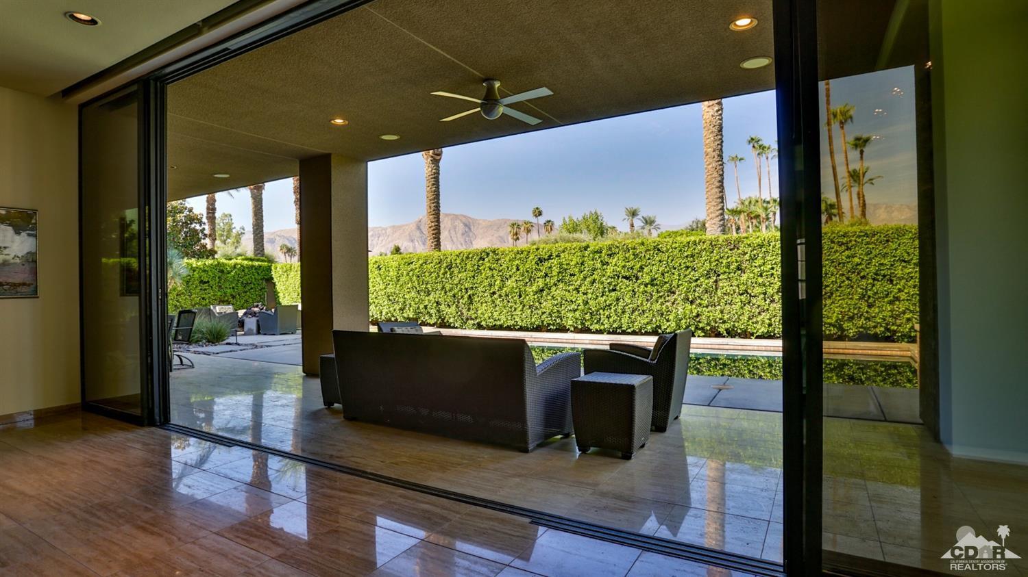 37 Sun Ridge Circle Rancho Mirage, CA 92270 - Photo 11 of 63 a view of living room filled with furniture and a potted plant