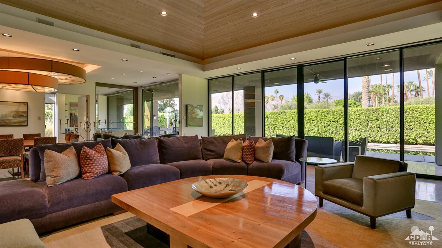 37 Sun Ridge Circle Rancho Mirage, CA 92270 - Photo 13 of 63 a living room with furniture and a large window