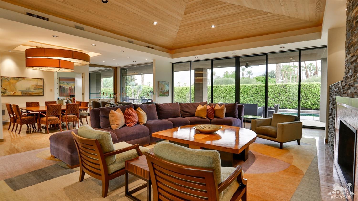 37 Sun Ridge Circle Rancho Mirage, CA 92270 - Photo 17 of 63 a living room with furniture and a large window