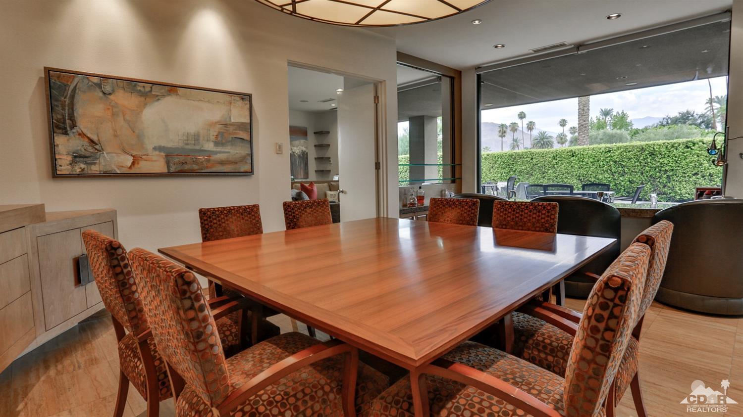 37 Sun Ridge Circle Rancho Mirage, CA 92270 - Photo 20 of 63 a view of a dining room with furniture window and wooden floor