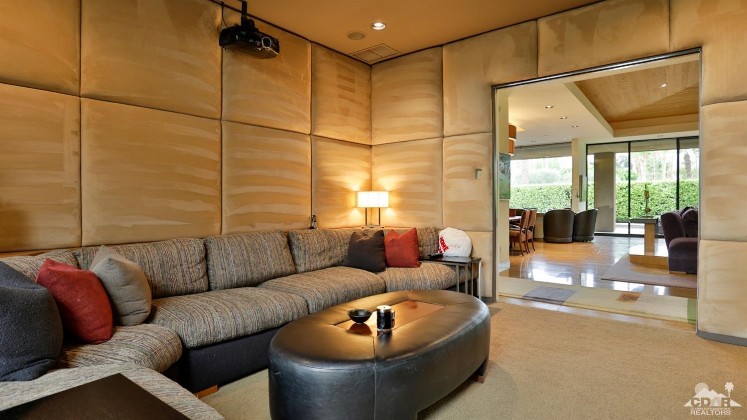 37 Sun Ridge Circle Rancho Mirage, CA 92270 - Photo 26 of 63 a living room with furniture and a couch