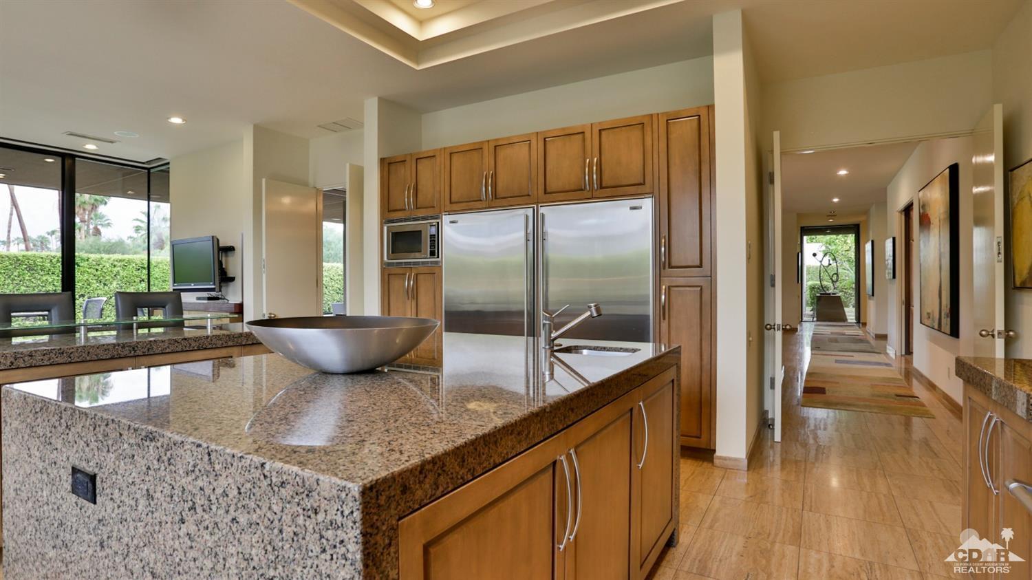 37 Sun Ridge Circle Rancho Mirage, CA 92270 - Photo 33 of 63 a kitchen with counter top space and stainless steel appliances
