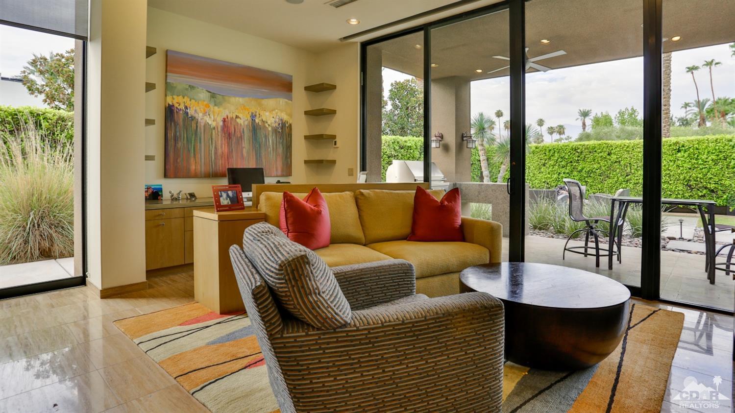 37 Sun Ridge Circle Rancho Mirage, CA 92270 - Photo 39 of 63 a living room with furniture and a large window