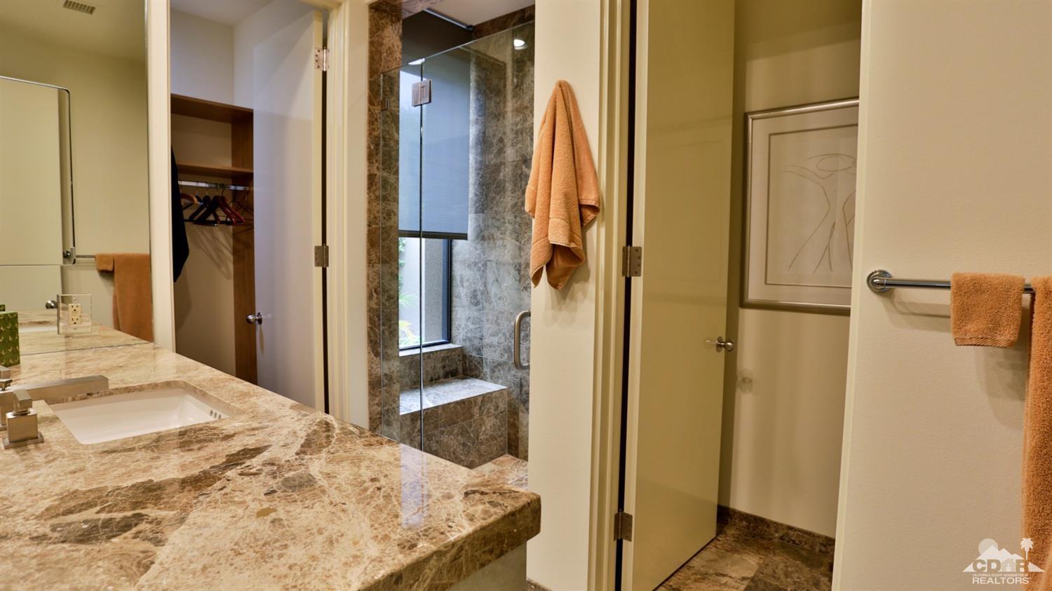 37 Sun Ridge Circle Rancho Mirage, CA 92270 - Photo 52 of 63 a view of a bedroom from bathroom