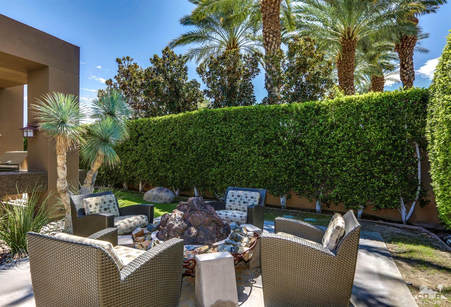 37 Sun Ridge Circle Rancho Mirage, CA 92270 - Photo 59 of 63 a view of a patio with couches and potted plants