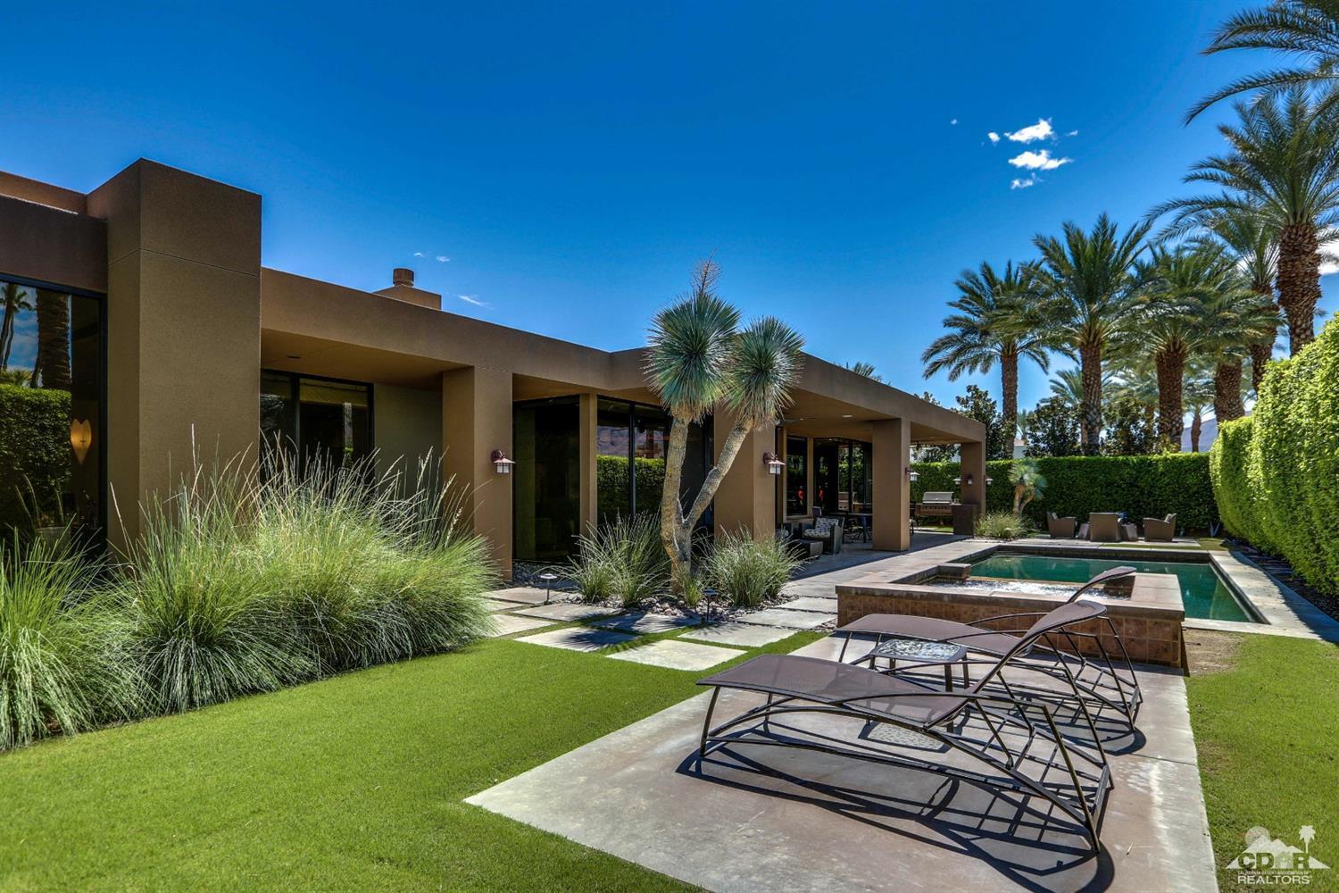 37 Sun Ridge Circle Rancho Mirage, CA 92270 - Photo 9 of 63 a front view of house with yard and outdoor seating