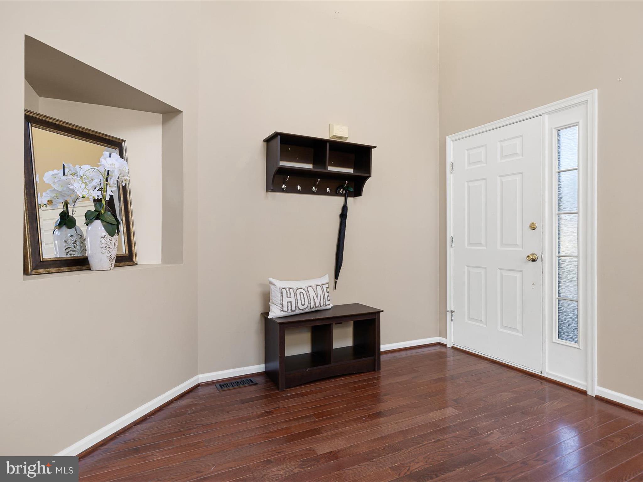 5 Meghan Lane Bear, DE 19701 - Photo 22 of 41 a view of a livingroom with wooden floor and a ceiling fan