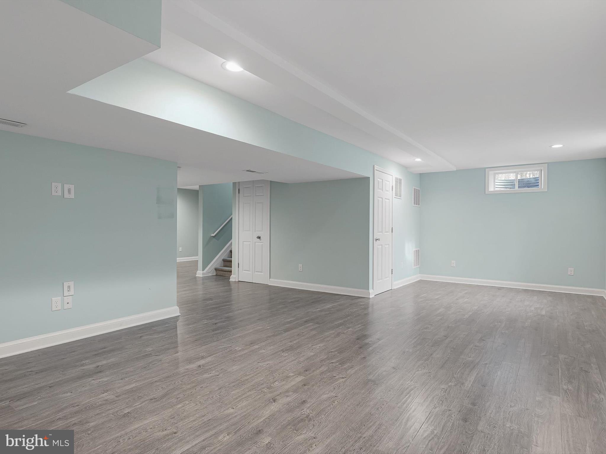 5 Meghan Lane Bear, DE 19701 - Photo 30 of 41 a view of an empty room with wooden floor and a window