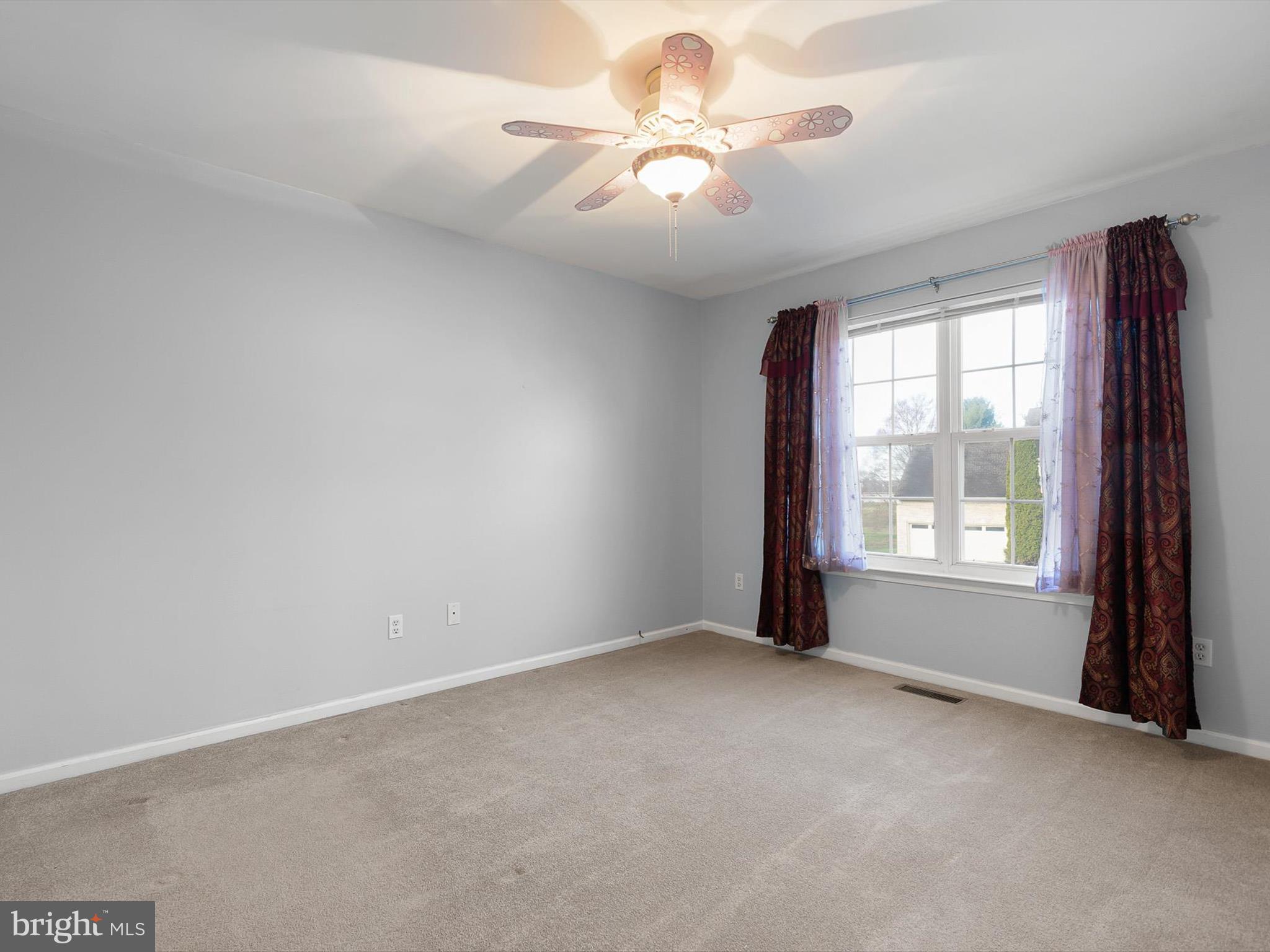 5 Meghan Lane Bear, DE 19701 - Photo 35 of 41 an empty room with windows and fan