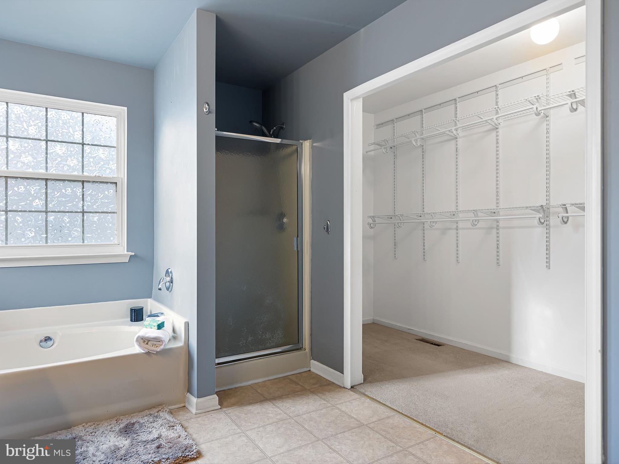 5 Meghan Lane Bear, DE 19701 - Photo 38 of 41 a bathroom with a bathtub and a shower