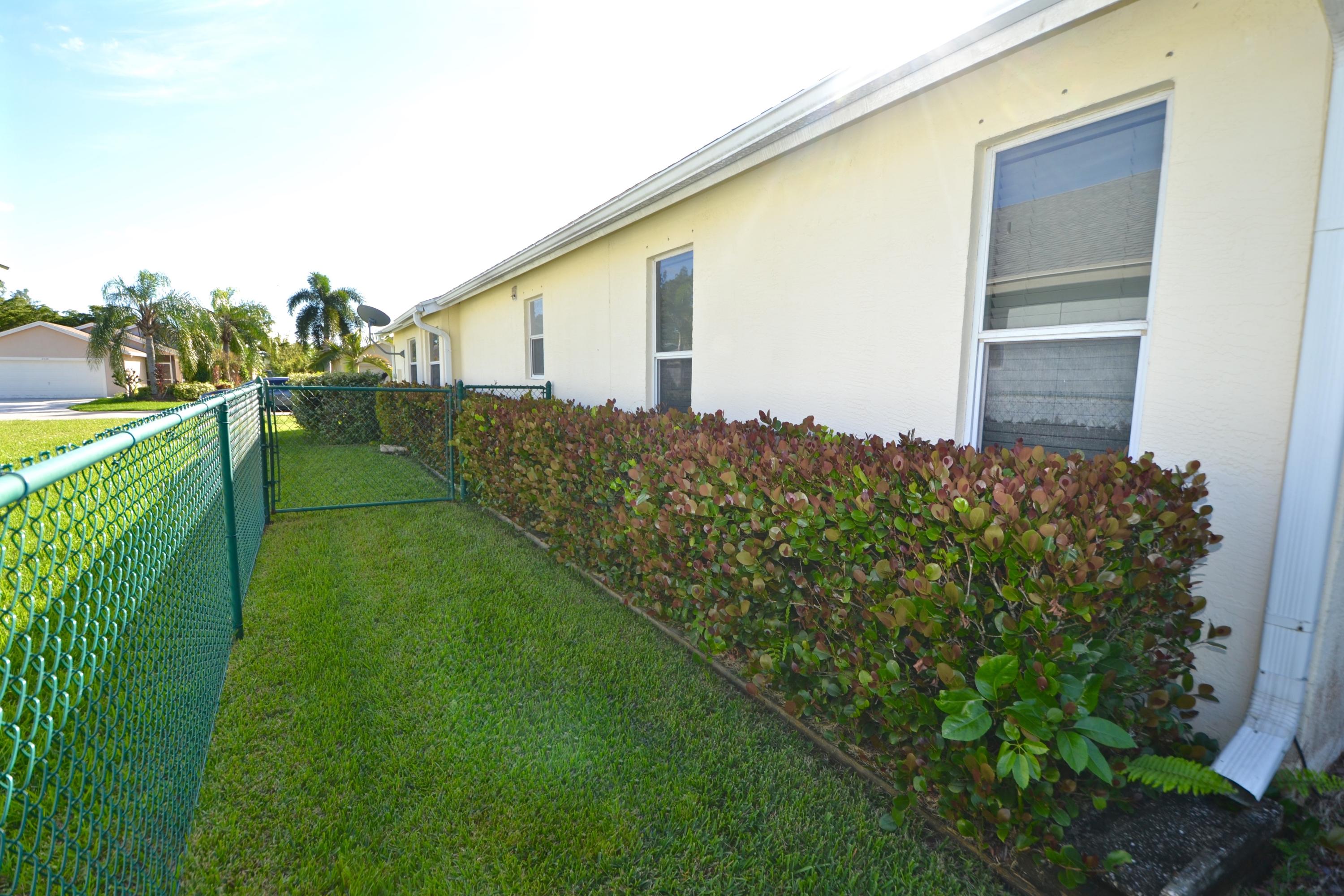 2439 Southwest Riviera Road Stuart, FL 34997 - Photo 54 of 72 EAST SIDE OF HOME