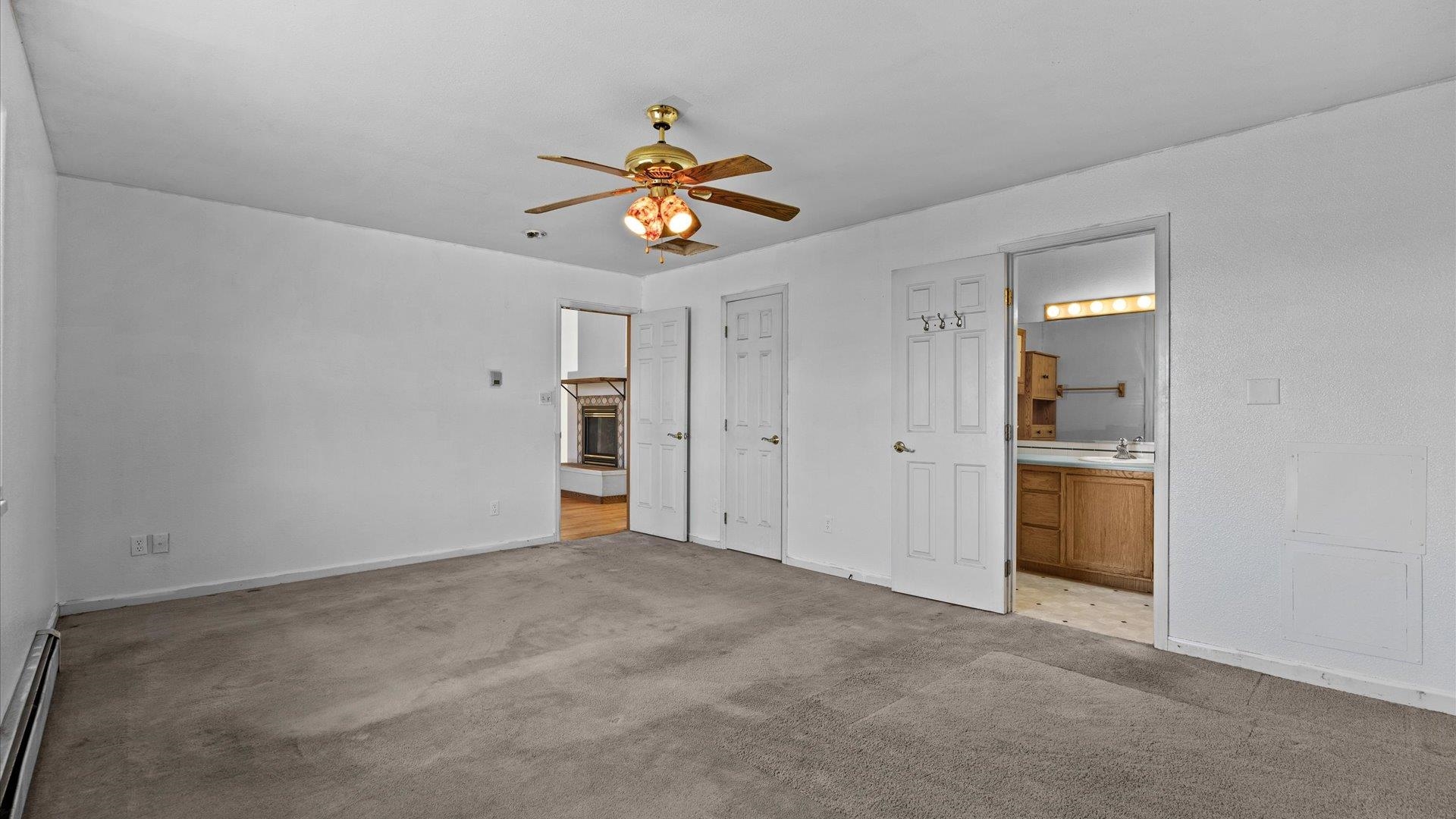 1351 M M 1/4 Road Loma, CO 81524 - Photo 22 of 36 a view of an empty room with a window
