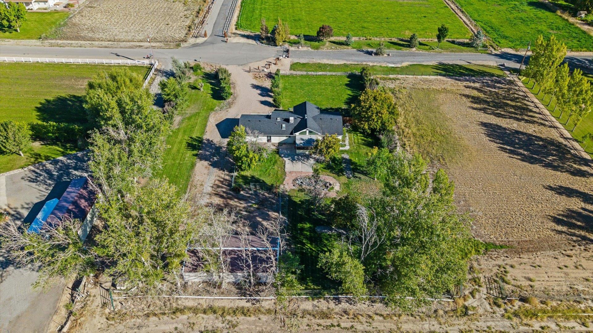 1351 M M 1/4 Road Loma, CO 81524 - Photo 29 of 36 a view of a garden with water