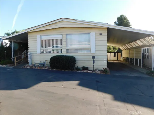 a front view of house with yard