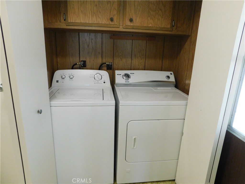 10675 Bryant Street, Unit 112 Yucaipa, CA 92399 - Photo 17 of 49 a utility room with dryer and washer