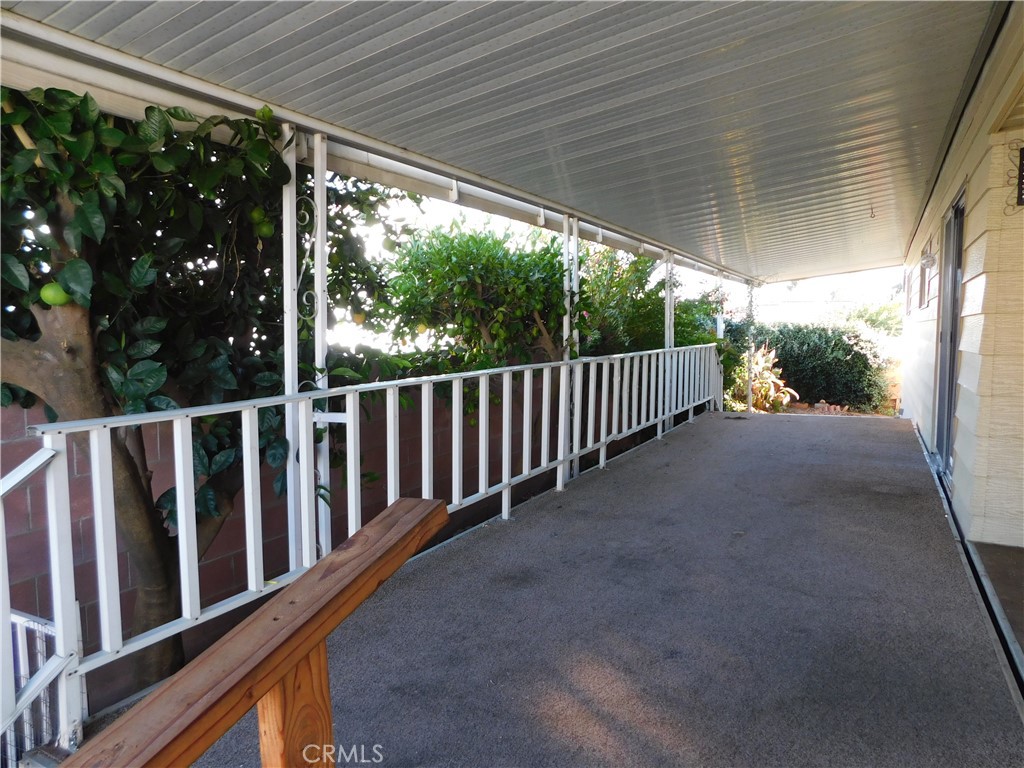 10675 Bryant Street, Unit 112 Yucaipa, CA 92399 - Photo 3 of 49 a view of a porch