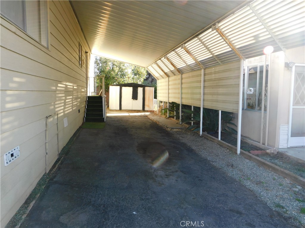 10675 Bryant Street, Unit 112 Yucaipa, CA 92399 - Photo 4 of 49 a view of an empty room with windows