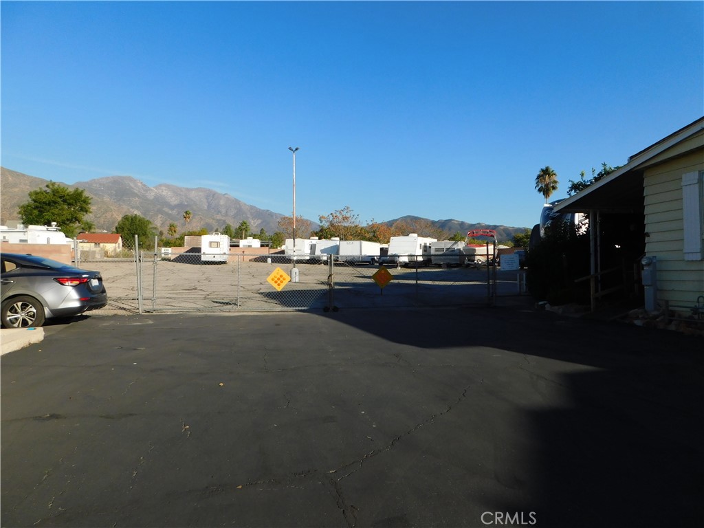 10675 Bryant Street, Unit 112 Yucaipa, CA 92399 - Photo 47 of 49 a view of car parked on the roadside