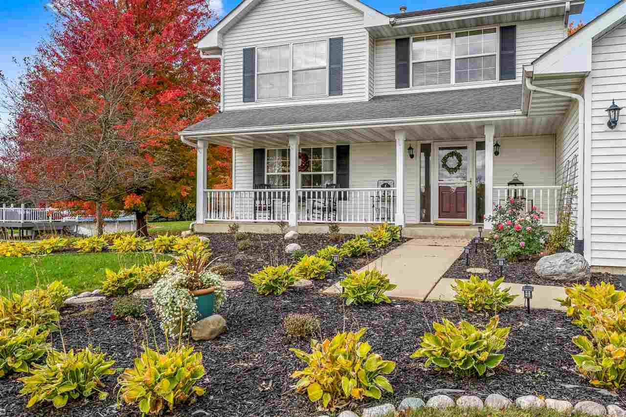 9414 Rambouillet Ridge Roscoe, IL 61073 - Photo 1 of 39 front view of a house with a yard