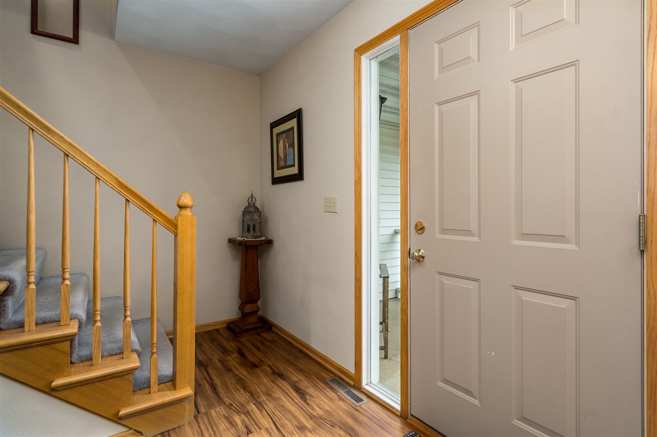 9414 Rambouillet Ridge Roscoe, IL 61073 - Photo 13 of 39 a view of a living room with a balcony