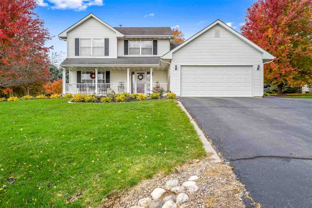 9414 Rambouillet Ridge Roscoe, IL 61073 - Photo 2 of 39 a view of an house with backyard space and garden