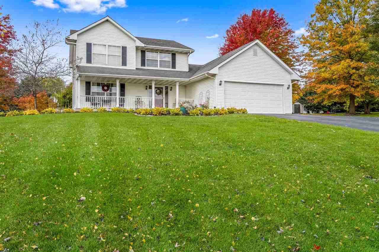 9414 Rambouillet Ridge Roscoe, IL 61073 - Photo 3 of 39 a view of a yard in front of house