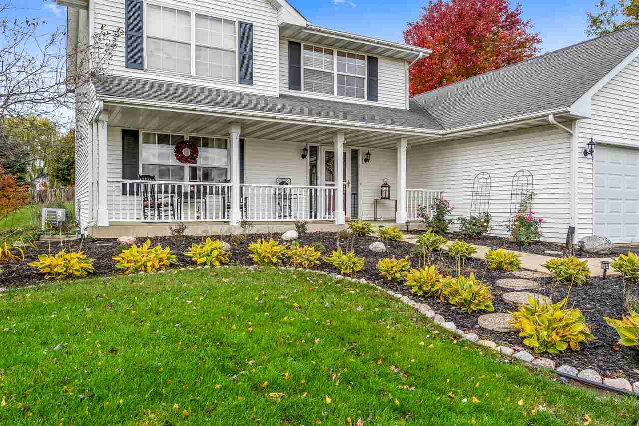 9414 Rambouillet Ridge Roscoe, IL 61073 - Photo 5 of 39 front view of a house with a yard