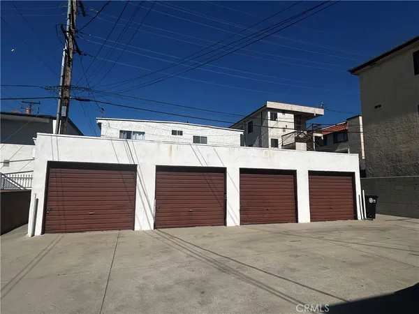 a front view of a house with a garage