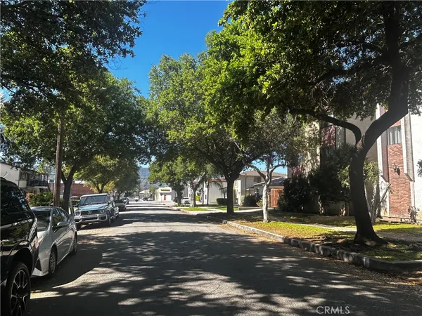 a view of a swimming pool with tree s