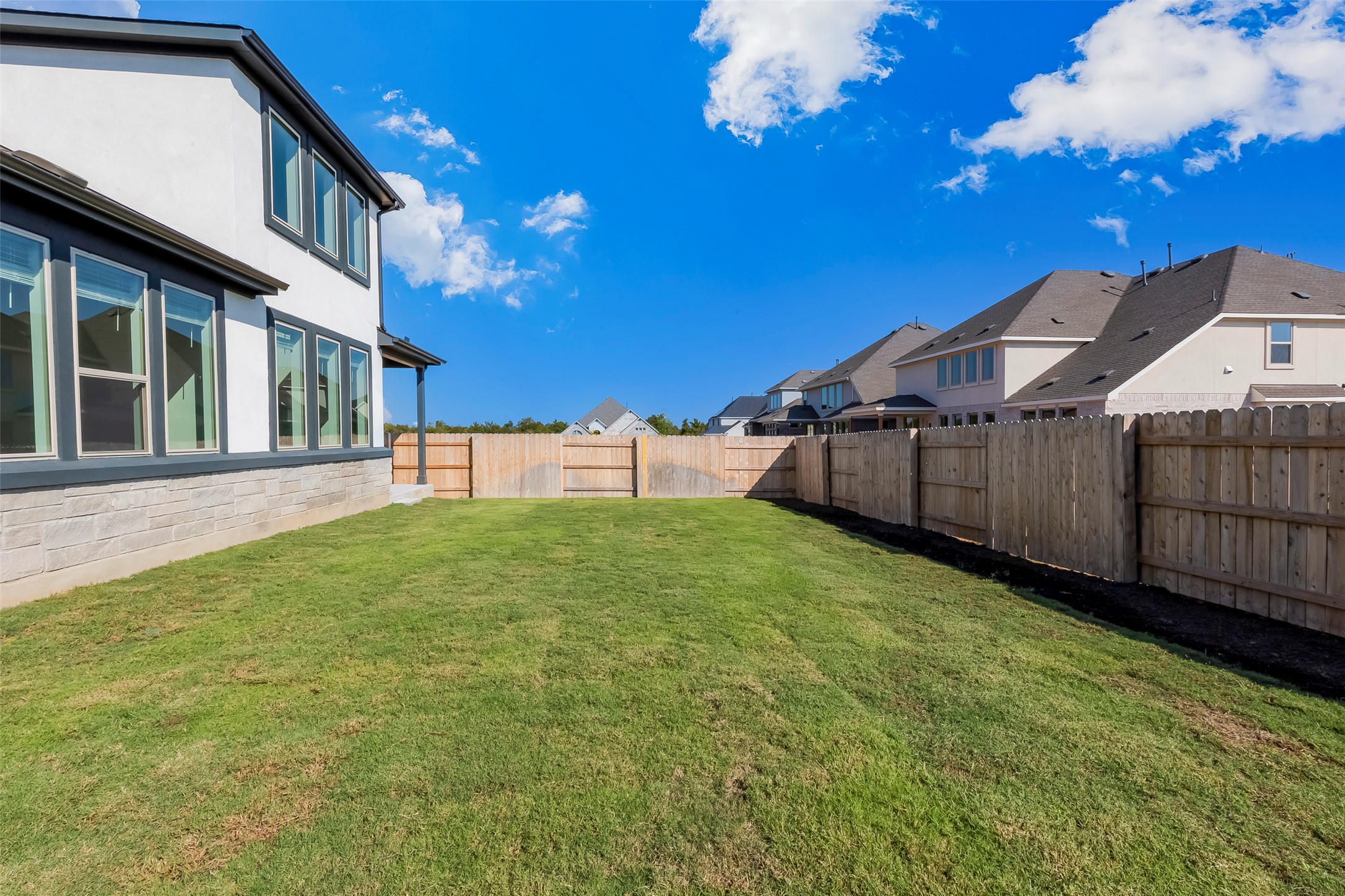 920 Old Gdn Road Leander, TX 78641 - Photo 36 of 39 Fenced backyard featuring a residential view
